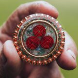 Traveler’s Triskelion - Handmade Pocket Orgonite reinhard stanjek red coil