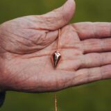 The Intuitive Navigator - Copper Pendulum reinhard holding